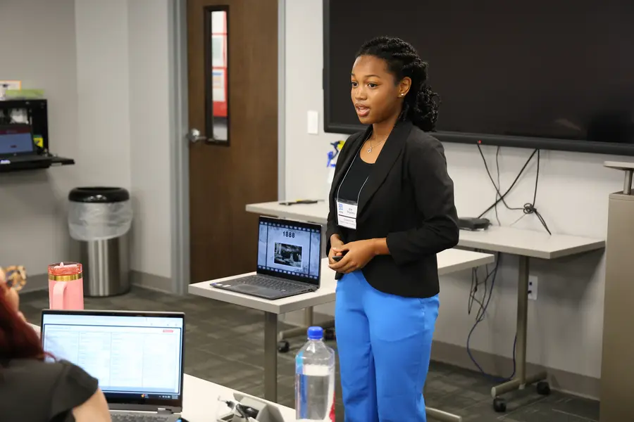A Wavemakers student delivering a speech at an NCFCA tournament